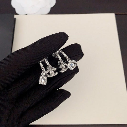 18K Chanel Flower Diamond Earrings